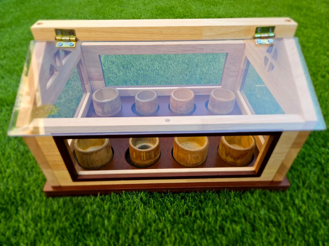 small wooden greenhouse